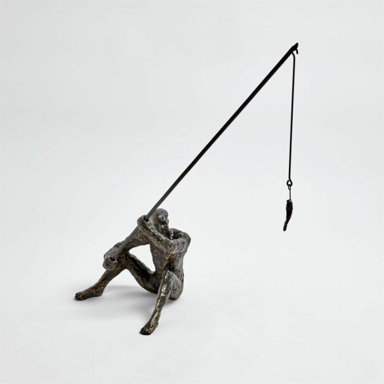 Cast Iron Sculpture of Fisherman - Image 4