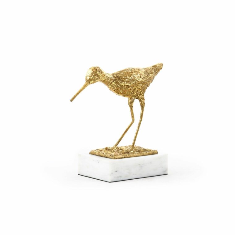 Gold Piper Statue