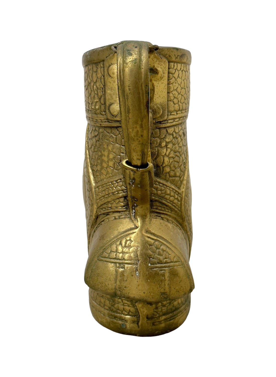 Close-up of vintage brass golf bag vase with intricate design details.