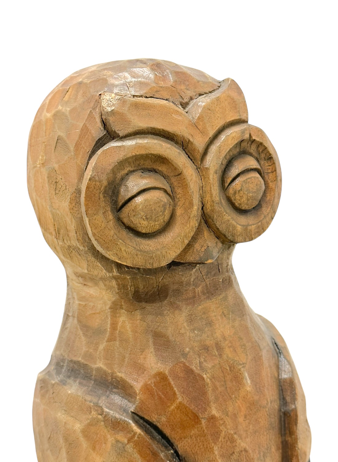 Close-up of Vintage Carved Owl Decor with intricate details and rustic charm.
