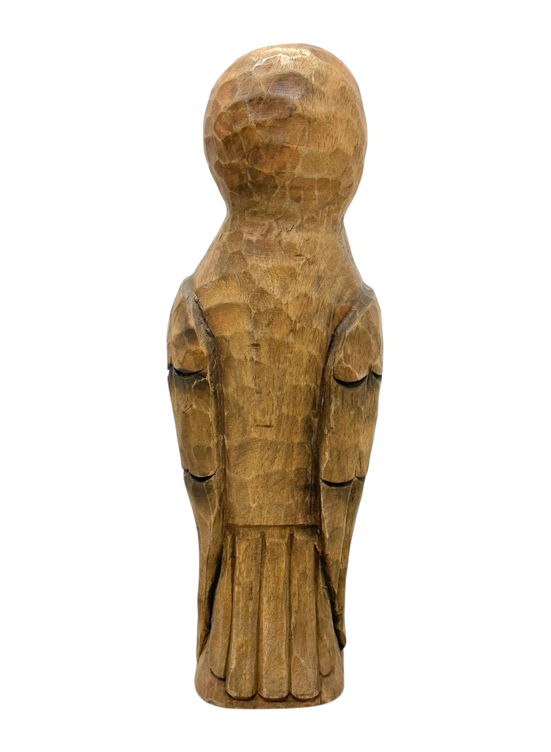Close-up of vintage carved wooden owl with intricate details.