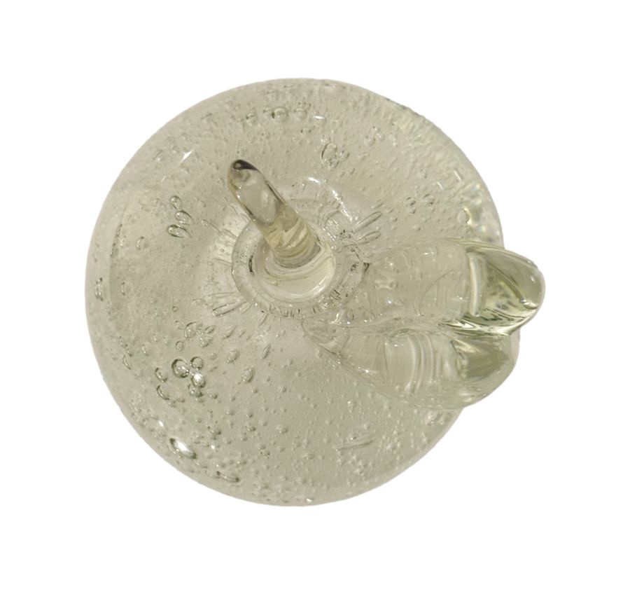 Close-up of vintage crystal apple, glowing with intricate details, circa 1990s.