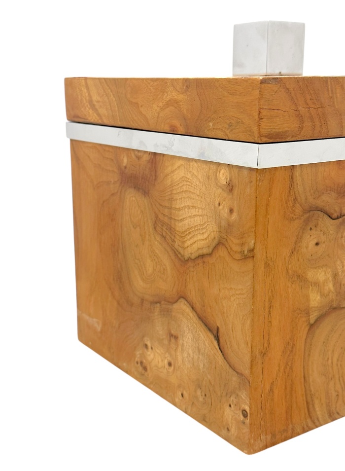 Close-up of vintage chrome ice bucket with burlwood lid.