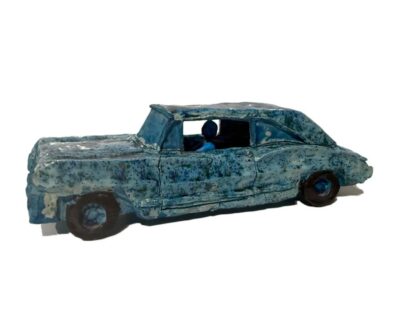 Vintage Ceramic Car and Driver Sculpture