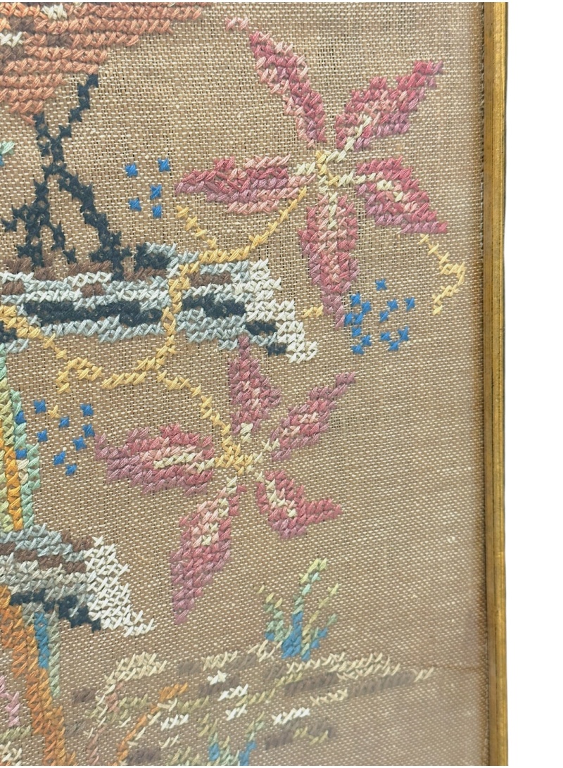 Vintage mid-century bird cross stitch art in black and gold frame