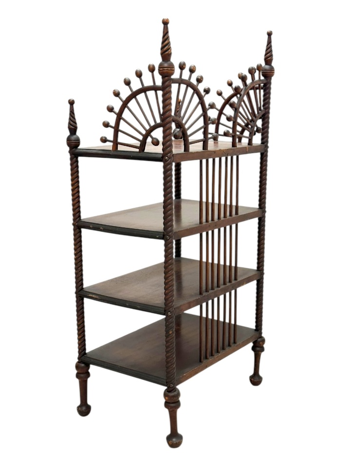 Antique etagere with intricate turned wood frame, four shelves, and elegant design.