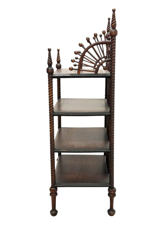 Antique wooden etagere with turned frame and four shelves, early 20th century design.
